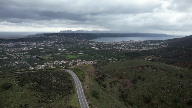 Aerial flight over hills near Chania toward Souda Bay - Crete