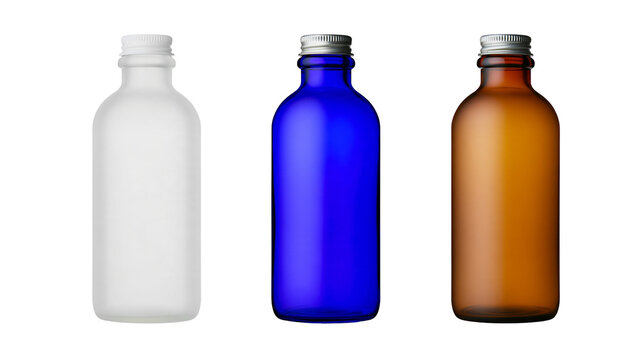 Isolated three empty glass bottles with screw caps in white, blue, and amber colors