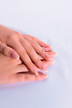 Female hands with French manicure in side perspective view