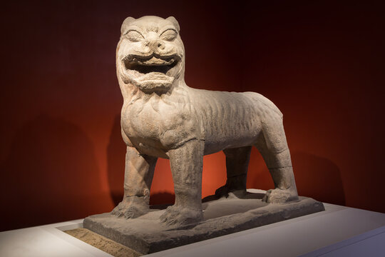An ancient Chinese sculpture of a walking lion, created during the Tang Dynasty (618&ndash;907 AD)
