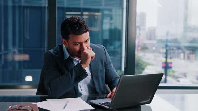Man, stress and laptop in office for finance, banking mistake and incorrect transaction with paper. Accountant, tech and headache in business for missing data, wrong information or tax audit deadline