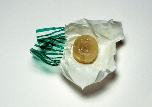 high angle view of an unwrapped hard candy  