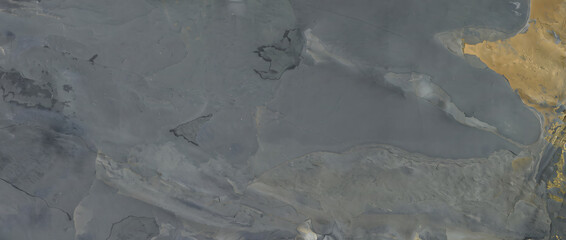 Moody blue gray marble texture with soft cloudy patterns and a striking golden edge for a dramatic stone background for commercial interior design use © UmmeFarhatunnesa
