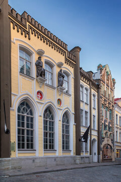 St Canute Guild Hall facade on Pikk street 20 in Tallinn, Estonia. Sunny day view of historic heritage building