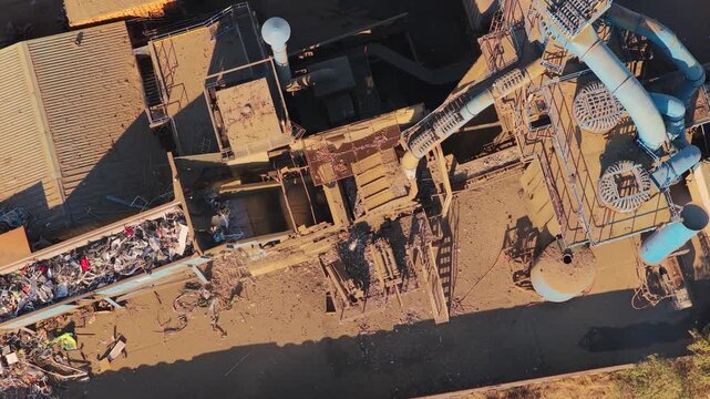 Aerial View of a Metal Recycling Plant Processing Scrap Materials on