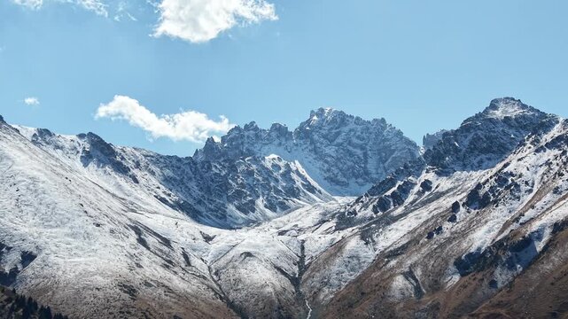 Cinematic 4K close up drone flyover showing detailed ice structure of glacier, fresh September snow on Issyk Bash peaks, dark green pine forest and mountain river near Akbulak in Tian Shan mountains