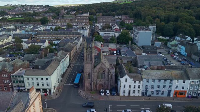 Aerial panoramic views of Whitehaven coastal town and civil parish. Demonstration of old Town architecture with roads and moving vehicles. Drone POV exploration of Devon County, England, UK.