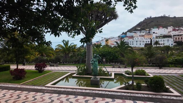Slow motion pan of Municipal Park in Arucas, Gran Canaria