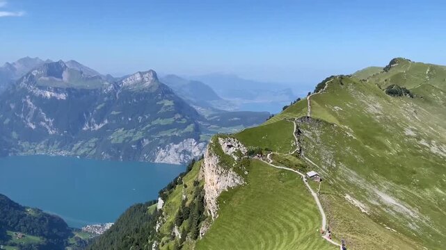 Aerial Drone View of Stoos Ridge Hiking Trail with Turquoise Lake Lucerne and Swiss Alps Switzerland