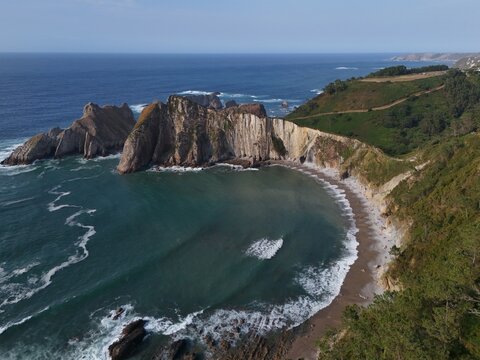 Playa del Silencio with Dramatic Cliffs and Atlantic Ocean in Cudillero, Asturias, Spain
