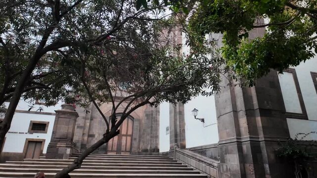 Slow motion establishing shot of colonial architecture and steps, Las Palmas, Gran Canaria