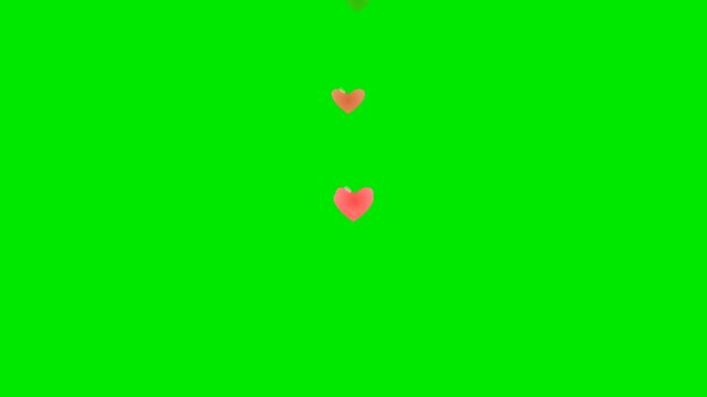 Three pink heart icons falling vertically on a solid green screen background with white space for text overlay.