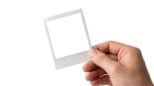 Blank polaroid photo held by hand isolated on transparent background