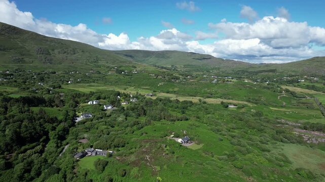 Aerial view of green valley with farmhouses at Caherdaniel Ireland
