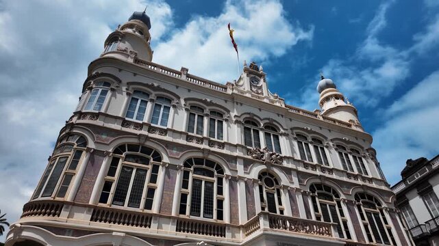 Slow motion low angle tilt up of Gabinete Literario building, Las Palmas, Gran Canaria
