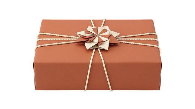 A beautifully wrapped gift box with natural twine and a delicate paper snowflake ornament