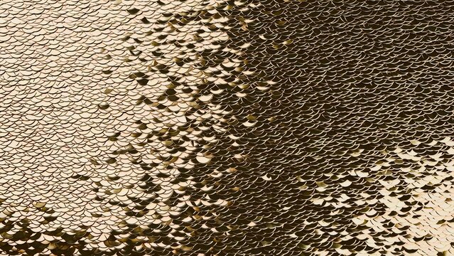 Gold sequin fabric shiny scales textile shimmer background closeup glamour ideal for product packaging greeting cards social media backgrounds web banners and interior design mockups