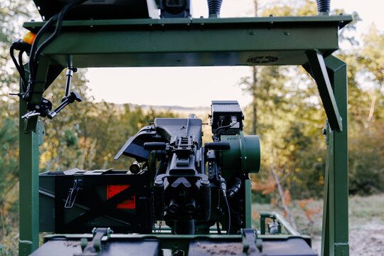 Remote weapon station mounted on military vehicle