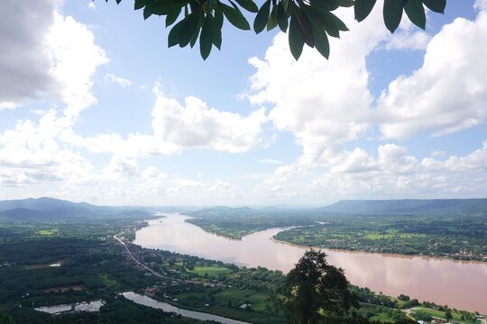 Panoramic view of the majestic Mekong River and natural landscape from Wat Pha Tak Suea in Sang Khom district, Nong Khai province, Thailand.