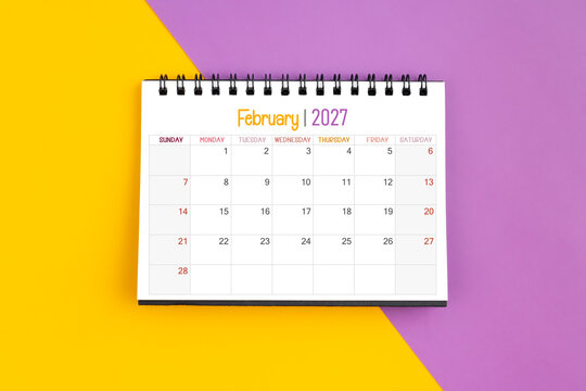 February 2027 Monthly desk calendar for 2027 year on yellow and purple color background.