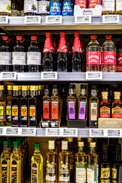 Supermarket Display Of Vinegar And Cooking Oils Including Essential Waitrose, Sarson's And Filippo Berio