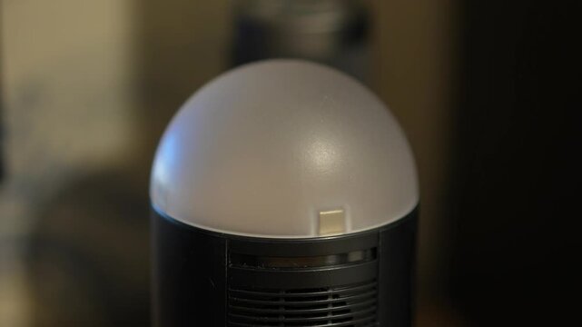 The back panel of a Godox AD100Pro pocket flash is shown in a close-up studio shot.