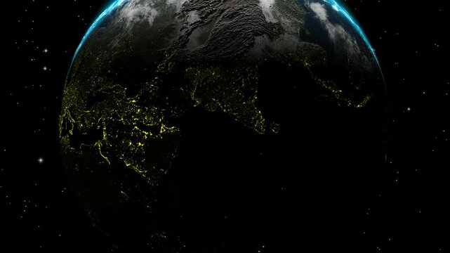 Rotating Planet Earth at Night with Glowing City Lights in Space