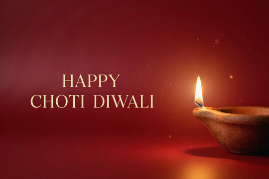 Happy Choti Diwali greeting with a glowing traditional clay diya lamp