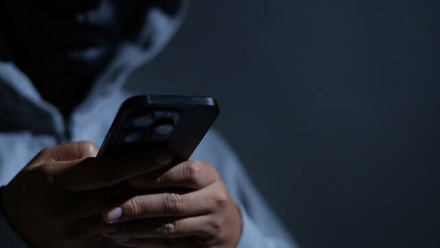 Scammers use phones and personal information to fraudulently obtain money from accounts.