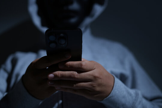 Scammers use phones and personal information to fraudulently obtain money from accounts.