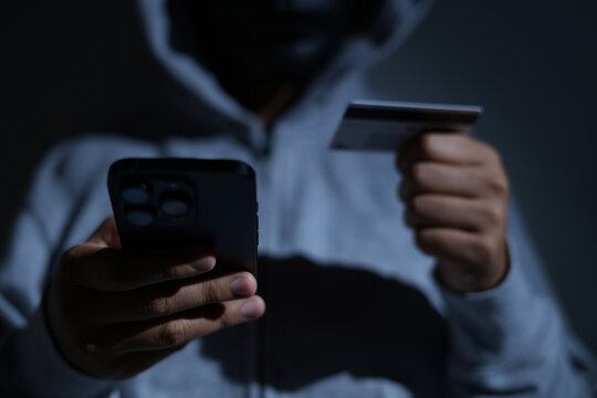 Scammers use phones and personal information to fraudulently obtain money from accounts.