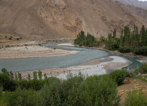 Khorog, Tajikistan - separated from Afghanistan by the Panj River, the Tajik border is an endless sequence of blue skies, high mountains and rural villages 

