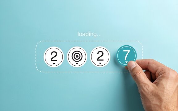 Hand Placing Number 7 Token in Loading Progress Bar on Blue Background
