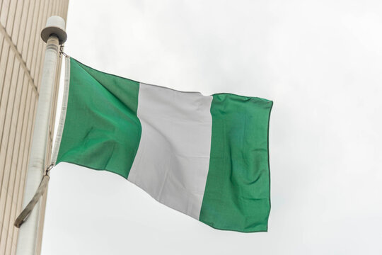The Nigerian flag on a flag pole at Toronto City Hall&rsquo;s Nathan Phillips Square.