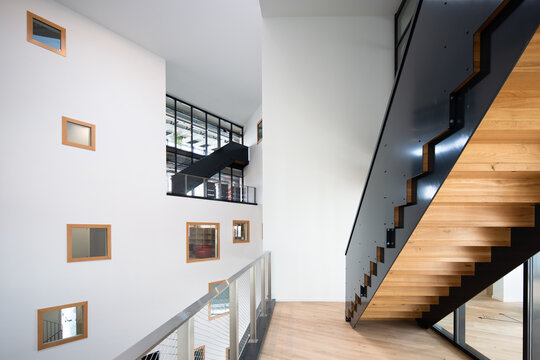 Modern office interior with staircase in coworking space