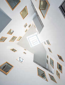 Modern office atrium with geometric window design