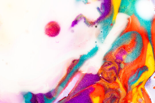 Colorful fluid paint swirl abstract background texture