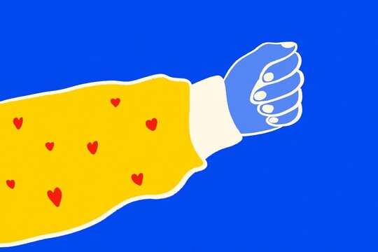 Hand gesture with hearts symbolizing love and kindness