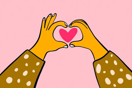 Hands forming heart gesture for Valentine's Day love