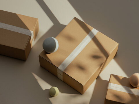 Cardboard boxes with decorative spheres and dramatic