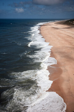 Aerial view of Atlantic Ocean waves on Nazare beach