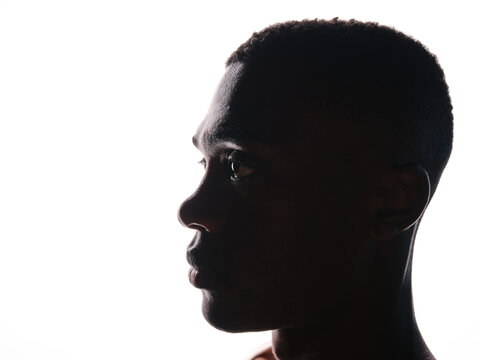 Black man profile silhouette contemplating future
