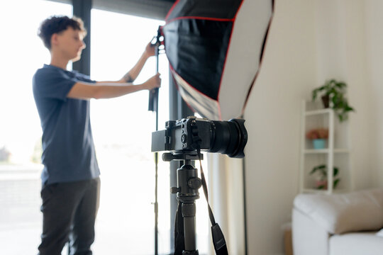 Content creator adjust octabox for video production setup