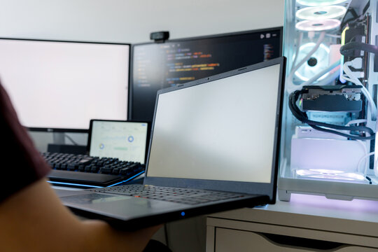Young man use AI tools on gaming computer workstation
