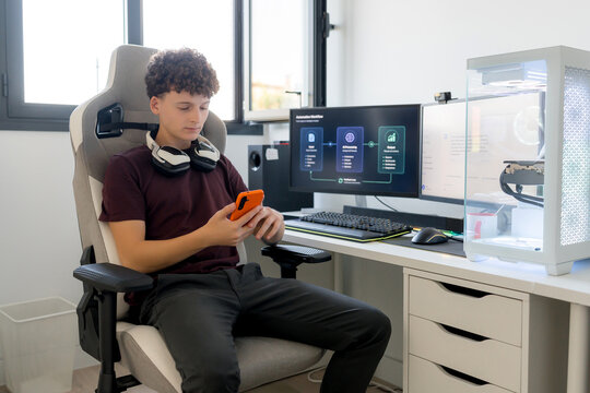 Young man use AI tools at gaming computer desk