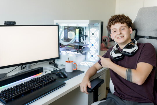 Young man present gaming computer setup with AI tools