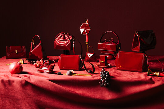 Red Luxury Handbags Still Life Arrangement