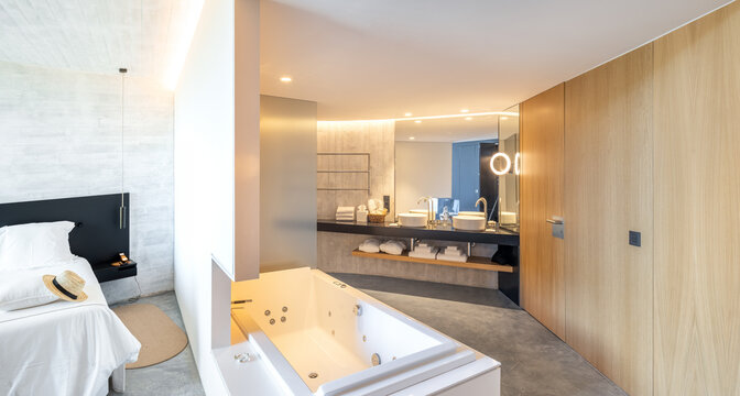Luxury villa bathroom with spa tub in Catalonia interior