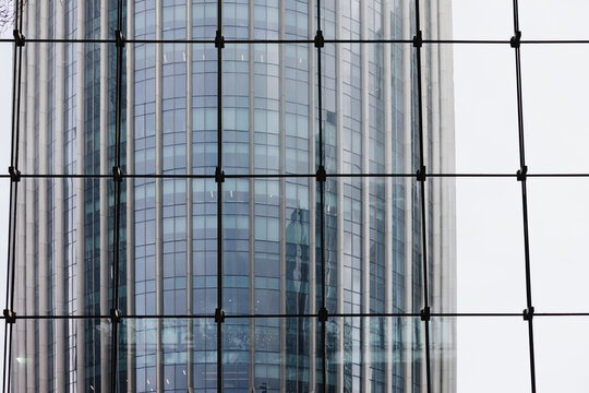 Modern Glass Skyscraper Seen Through Window Grid