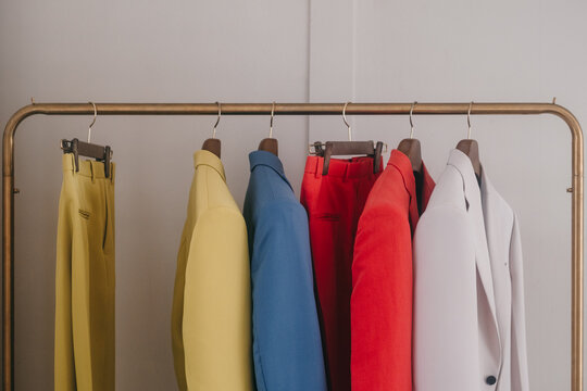Suits hanging on a rail